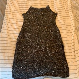 Cowl neck sleeveless sweater.